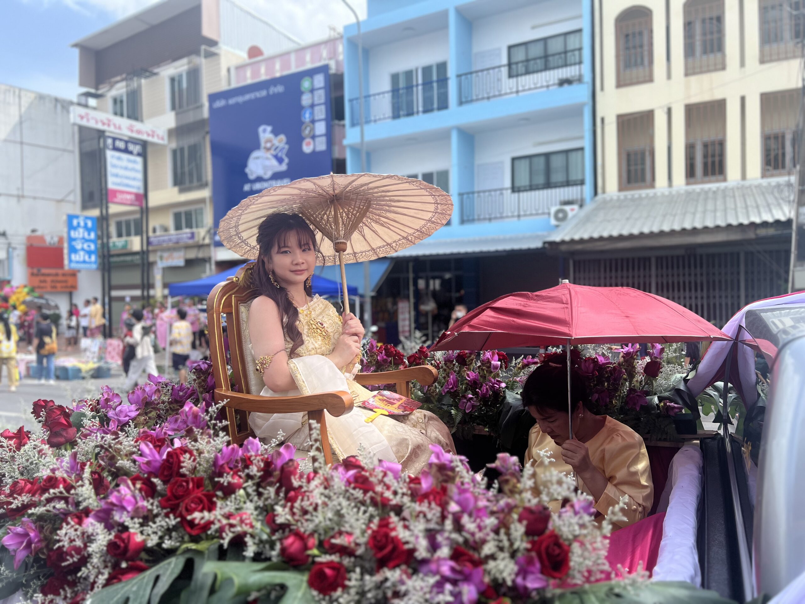 Beauty contestant on a float at Ubon Candle Festival