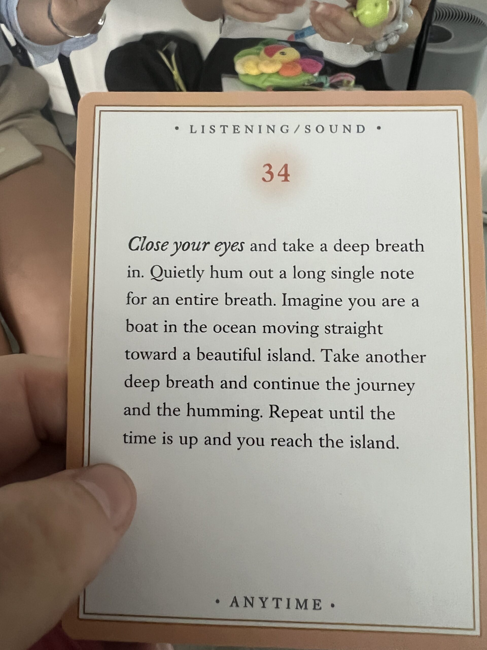 Mindfulness prompt card with guided humming and breathing exercise