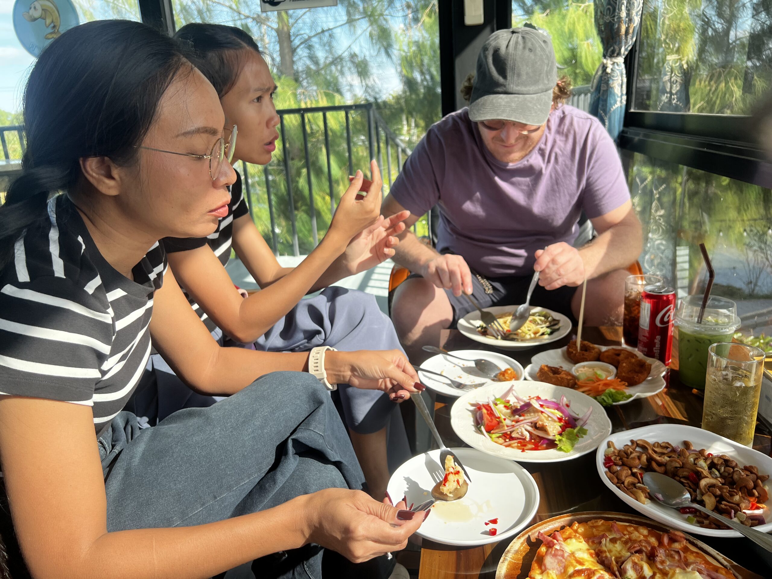 Marcus sharing a meal with locals at a cultural gathering